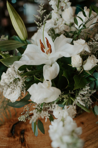 white lily sympathy bouquet Sympathy Arrangement in a Basket – Thistle & Twig Flowers